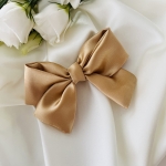 Mała kokarda do włosów Na spince Złota