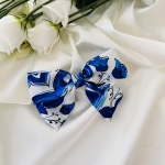 Mała kokarda do włosów Na spince Flair