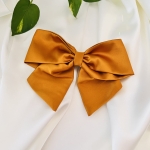 Duża kokarda do włosów Na spince Miodowa