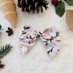 Mała kokarda do włosów Na spince Holly